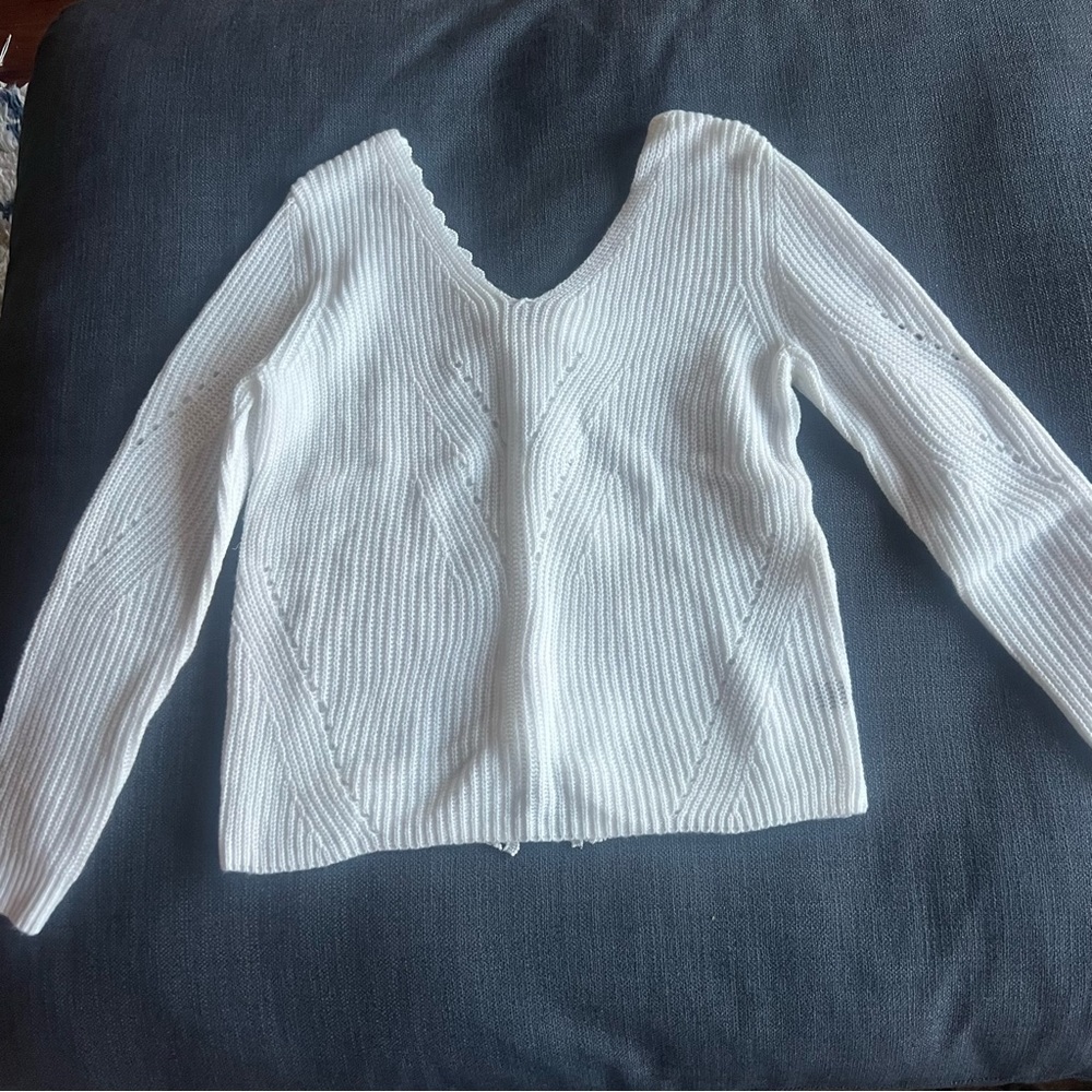 White sweater w back cut outs